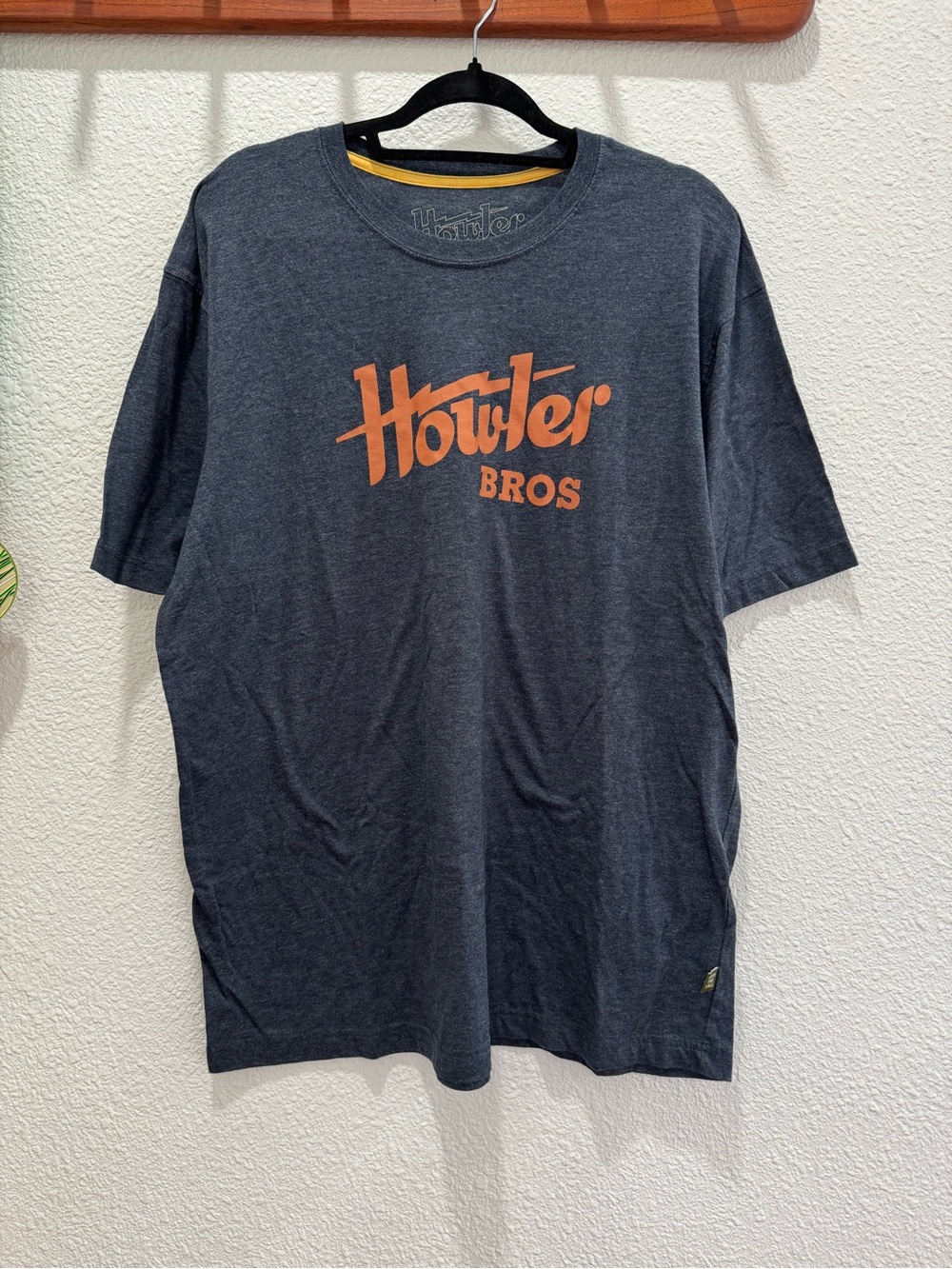 Howler Brothers Navy Tee with Orange Logo